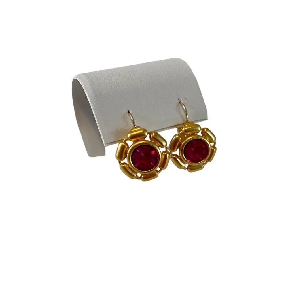 Beautiful pink stone & bright yellow gold toned huggie hoops.